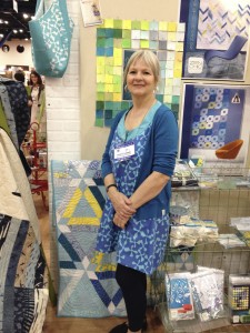While I interview most Moda designers by phone, others, including Brigitte Heiland, Janet Clare,  and Jen Kingwell live overseas, so Market is the perfect time to find out what's new. Here's Brigitte at Fall 2014 Market.